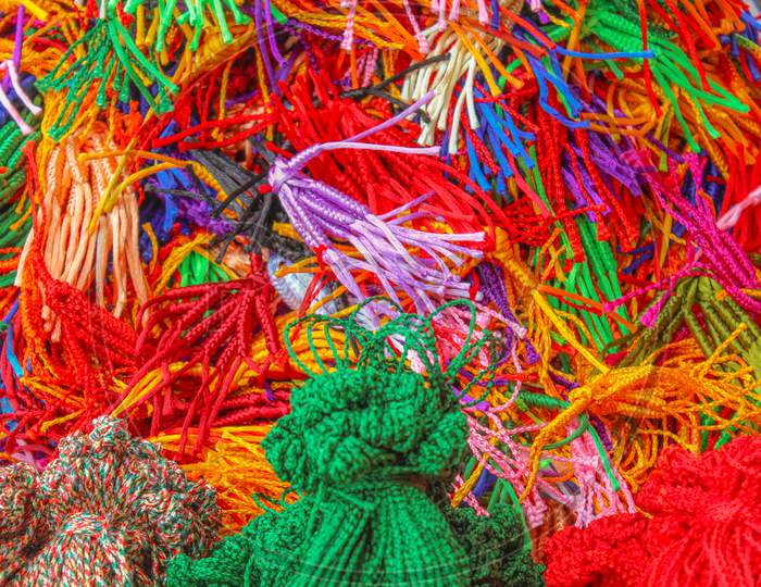 Colorful Holy threads at the Buddhist Monastery in Bylukoppa/India.
