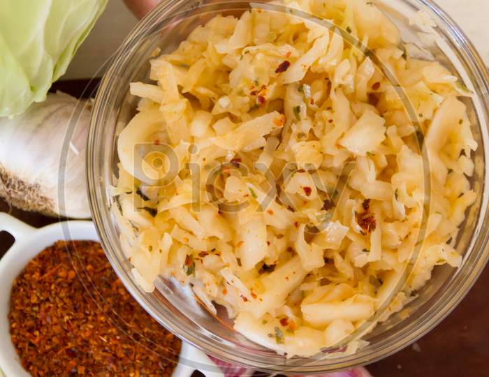 Handmade Preparation Of Sauerkraut And Cabbage Kimchi