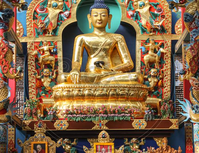 The Golden Buddha Statue at Bylukoppa town in Coorg district of Karnataka/India.