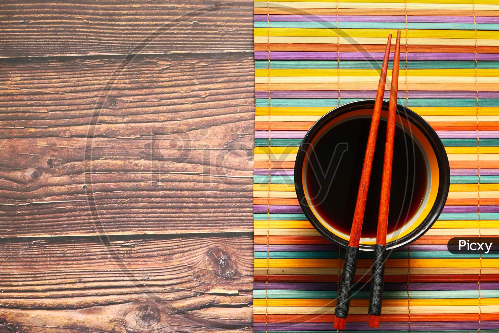 Japanese Food Cooking Set With Soy Sauce, Bamboo Sticks On Wooden Table.
