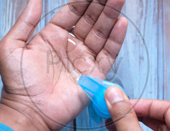 Man'S Hands Using Hand Sanitizer Gel, Healthcare And Medical .