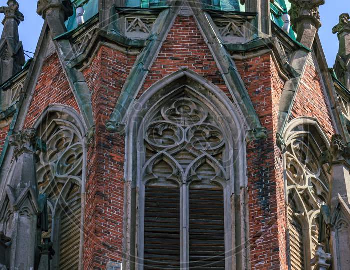 Riga, Latvia- May 29 2020: Red Brick Religion Building Art Decors And Window