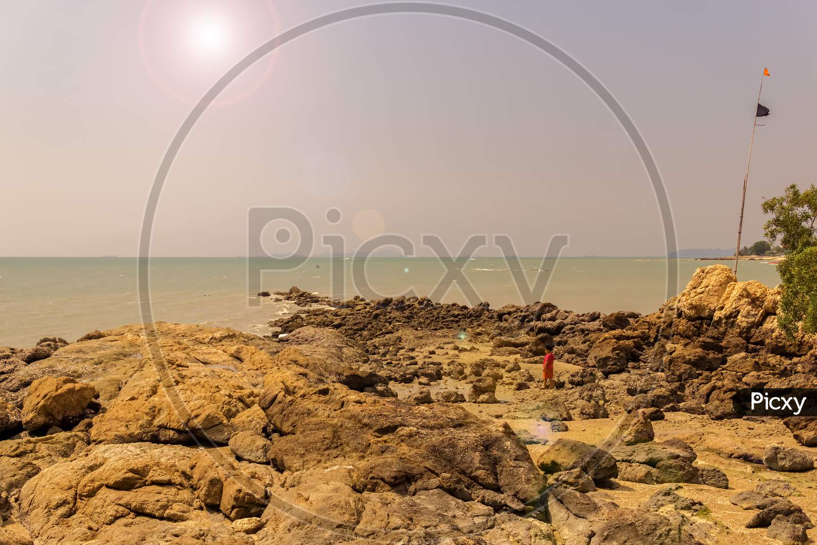 Pattaya,Thailand - April 20,2018: Coral Beach This Is A Small Beach With Many Rocks And Stones And With A View To The Sea.