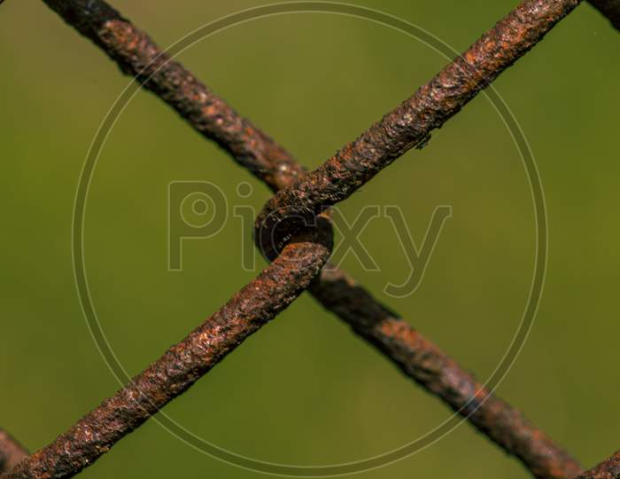 Rusty Metal Fence, Weave Close Up