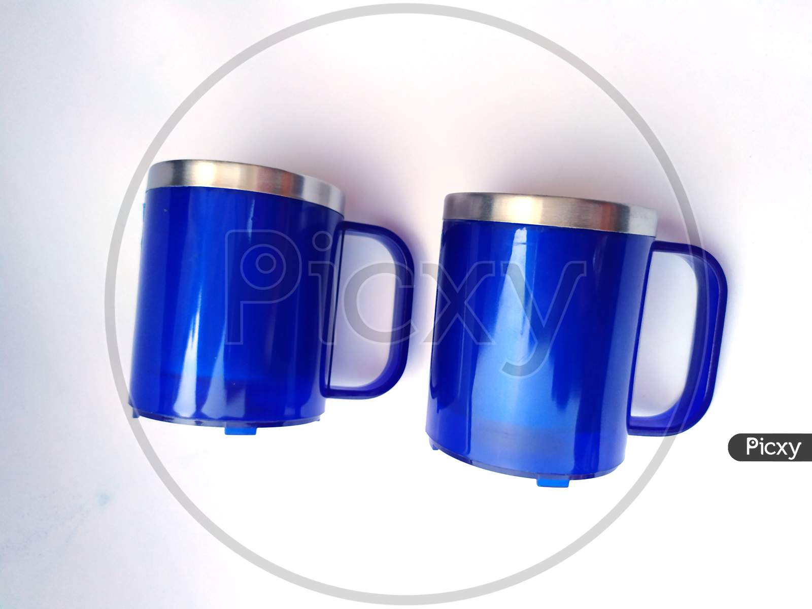 blue plastic coffee mug isolated on white background