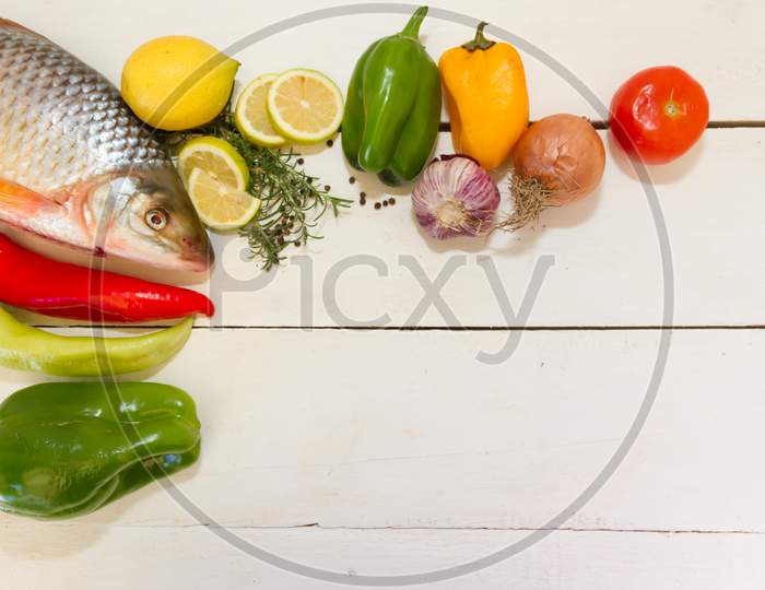 Fish And Vegetables With Place For Text