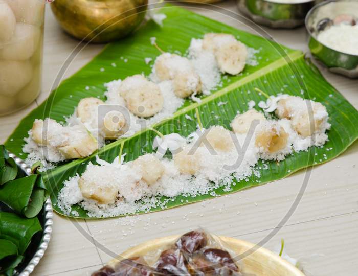 Food material served in banana leaf during a ritual of rice ceremony in India