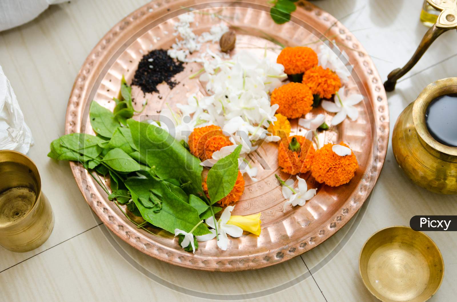 Flowers kept in plate during a ritual of rice ceremony in India