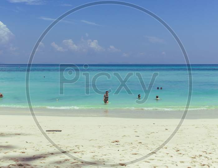 Phi Phi Island, Thailand- April 4 2019: Clear White Sand Beach, Crystal Blue Water