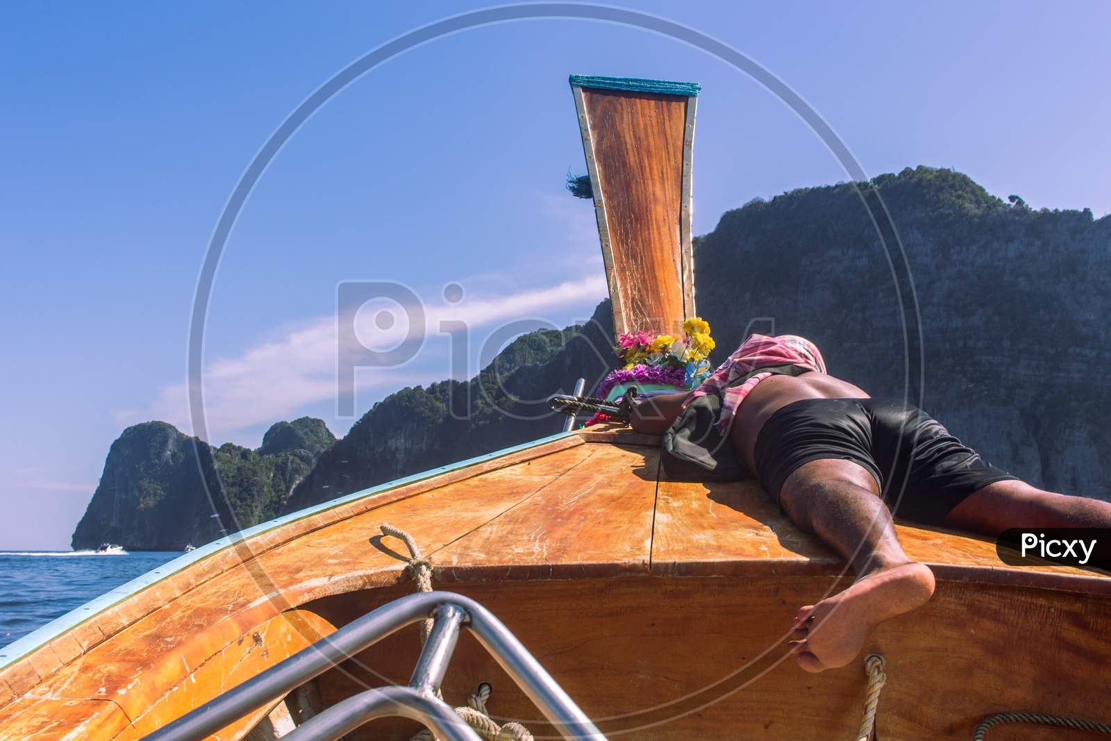 Phi Phi Island, Thailand- April 4 2019: Traditional Long Tail Boat, Sleeping Guide