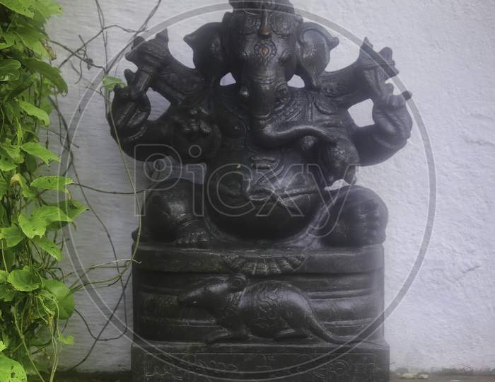 A Sculpture Of An Indian God Ganesha