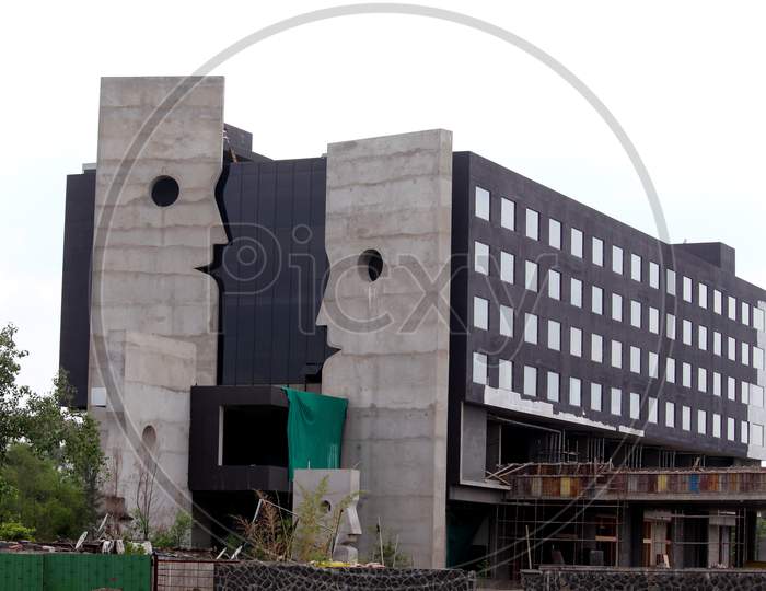 Under Construction Building With Face Shape