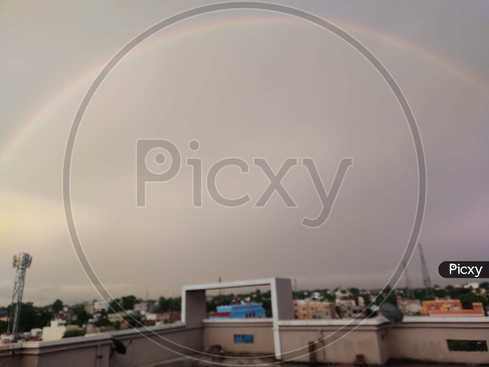rainbow (double) seen from apartment rooftop