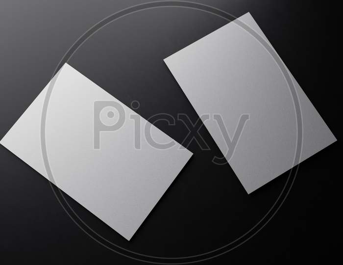 White Vertical Business Card Paper Mockup Template With Blank Space Cover For Insert Company Logo Or Personal Identity On Black Cardboard Floor Background. Modern Concept. 3D Illustration Render