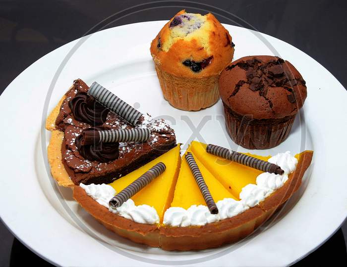 Chocolate Pineapple Cake And Muffins
