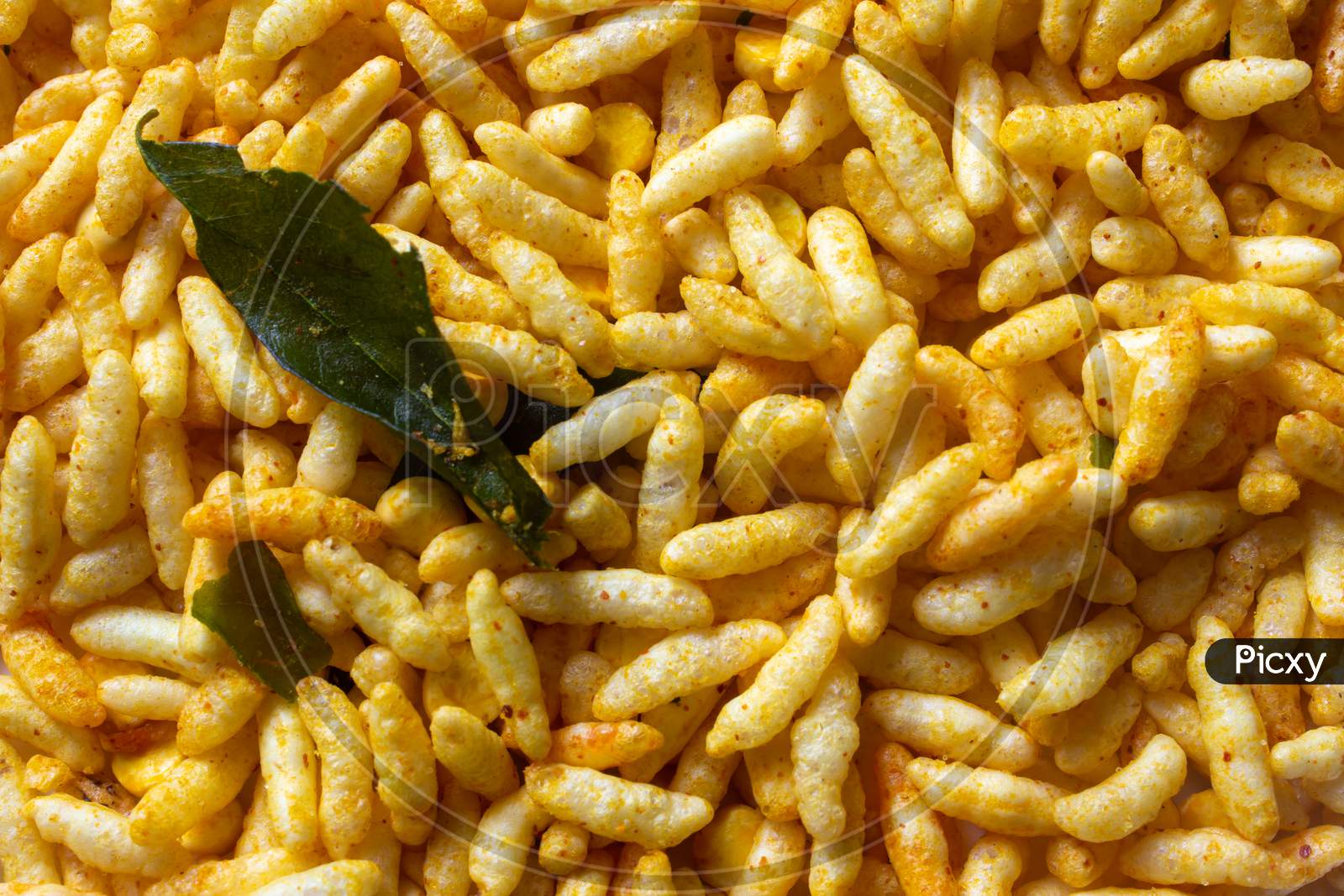 Spicy Puffed Rice (Also Known As Muri, Porri) In A Plate. Muri Is Famous Savory Of Indian Subcontinent