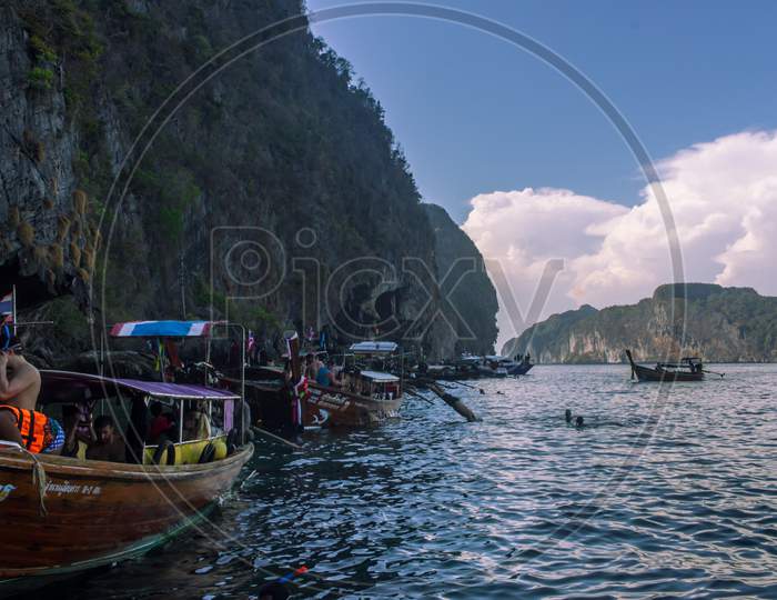 Phi Phi Island, Thailand- April 4 2019: Traditional Long Tail Boat Ride Island Trip
