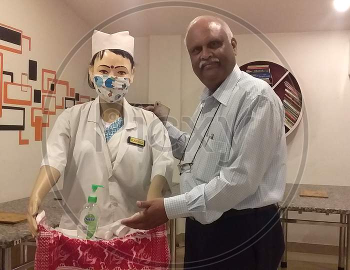 Assam Based Innovator SN Farid During A Demonstration Of robots which serve food and medicine to Covid-19 patients and facilitate virtual meeting with doctors, In Guwahati ,India