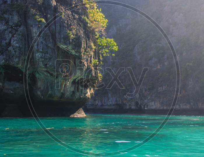Phi Phi Island, Thailand- April 4 2019:  Huge Sea Rocks, Crystal Blue Water