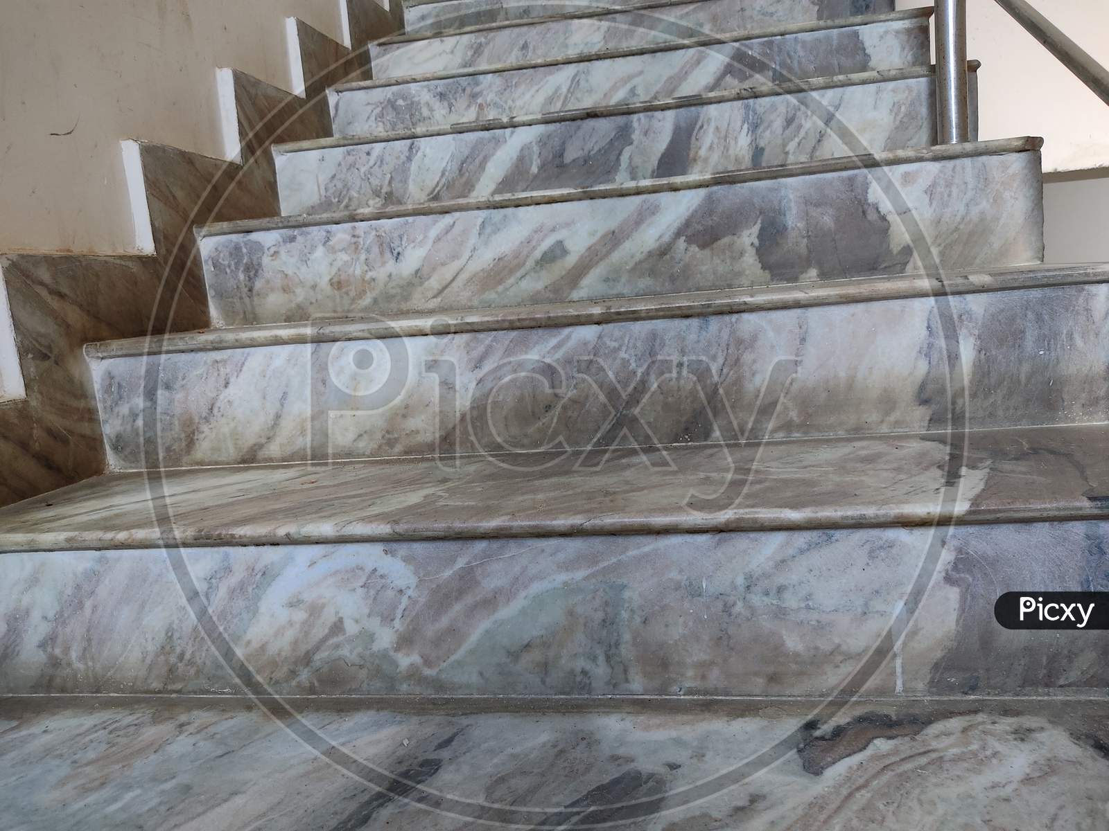 stairs of an apartment made of marble with wall