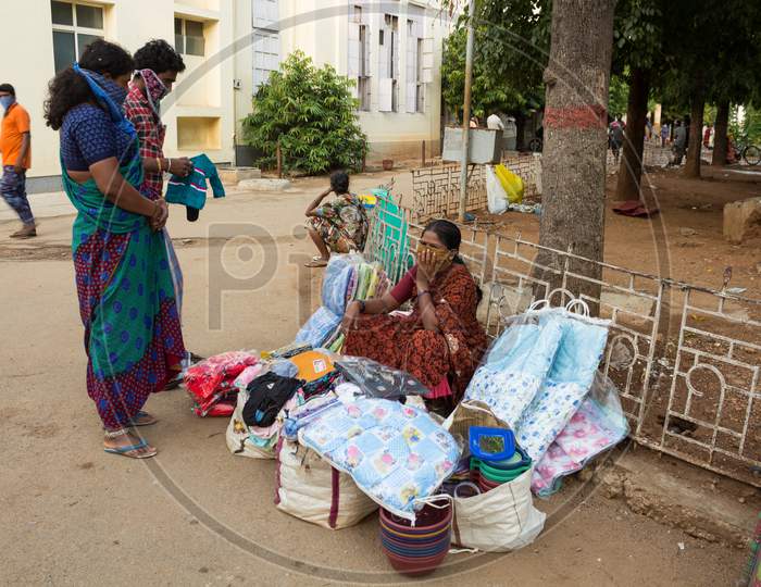 A Street Vendor selling essential clothing and Masks in KR Hospital in Mysore/Karnataka.