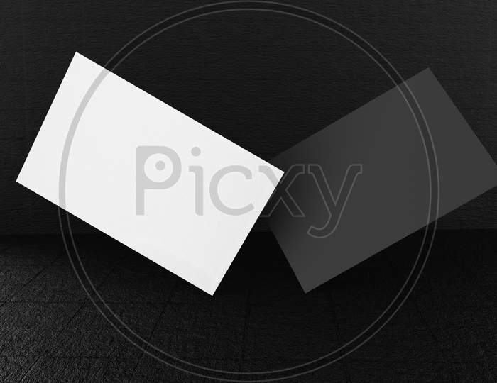 Black And White Business Card Paper Mockup Template With Blank Space Cover For Insert Company Logo Or Personal Identity On Black Concrete Floor Background. Modern Concept. 3D Illustration Render