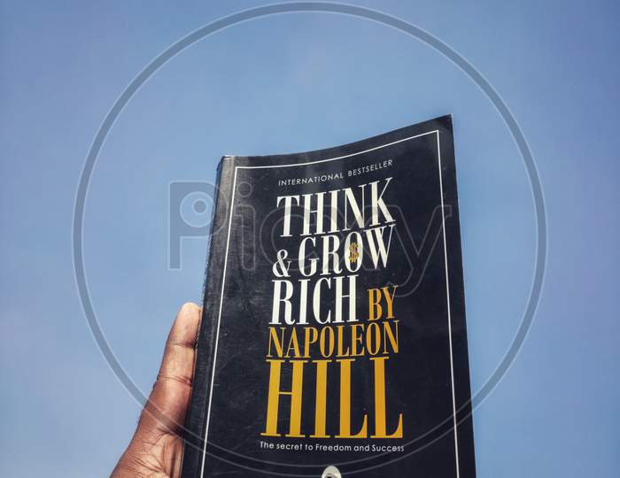 Think and grow rich book isolated with sky in  background with vintage look in ludhiana punjab india on 15 april 2020
