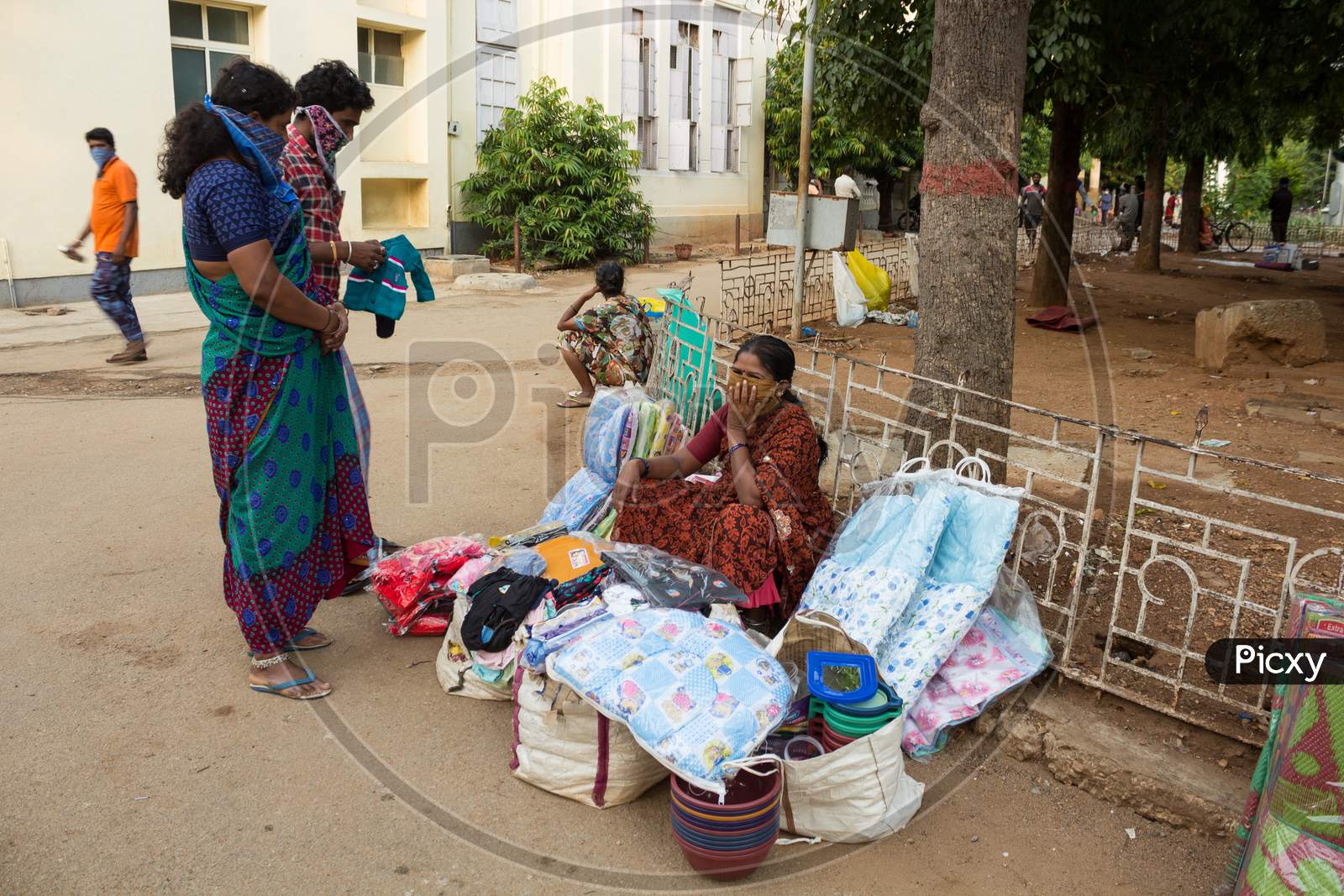 A Street Vendor selling essential clothing and Masks in KR Hospital in Mysore/Karnataka.