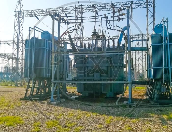 transformer is in working in punjab in india in 2020 in a substation ,High voltage switchyard and electrical power substation.