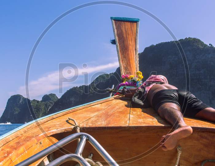 Phi Phi Island, Thailand- April 4 2019: Traditional Long Tail Boat, Sleeping Guide