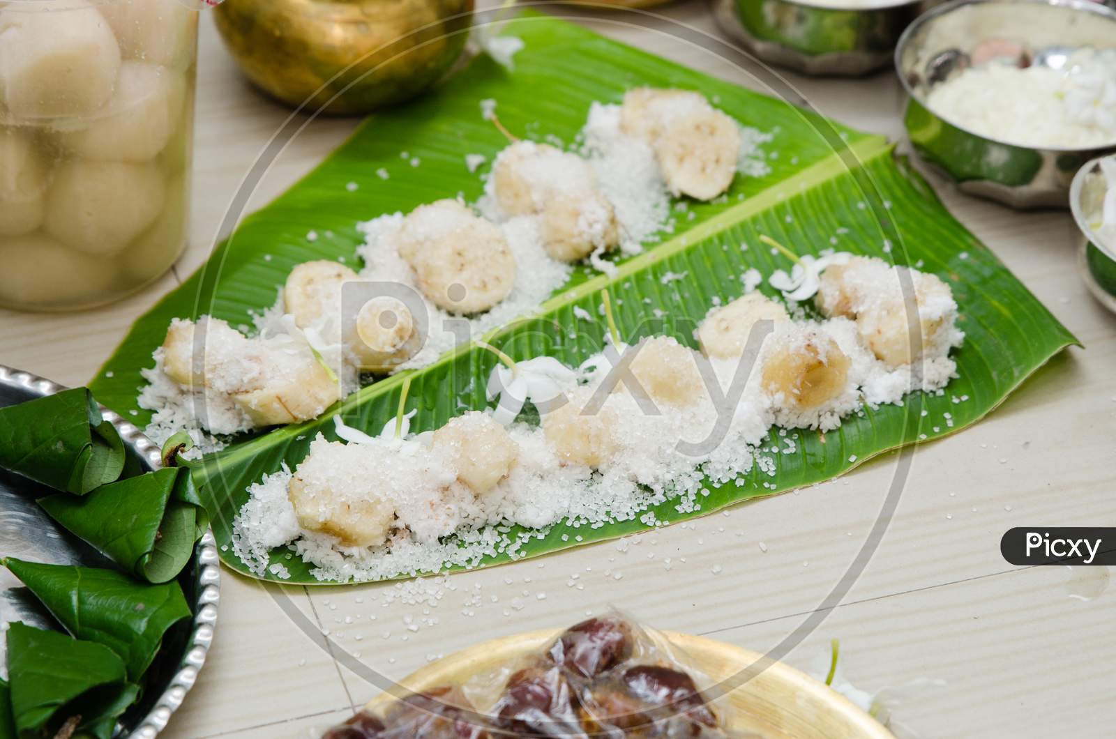 Food material served in banana leaf during a ritual of rice ceremony in India