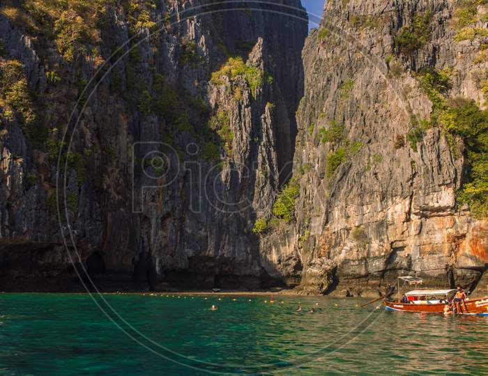 Phi Phi Island, Thailand- April 4 2019: Traditional Long Tail Boat Trip, Crystal Blue Water