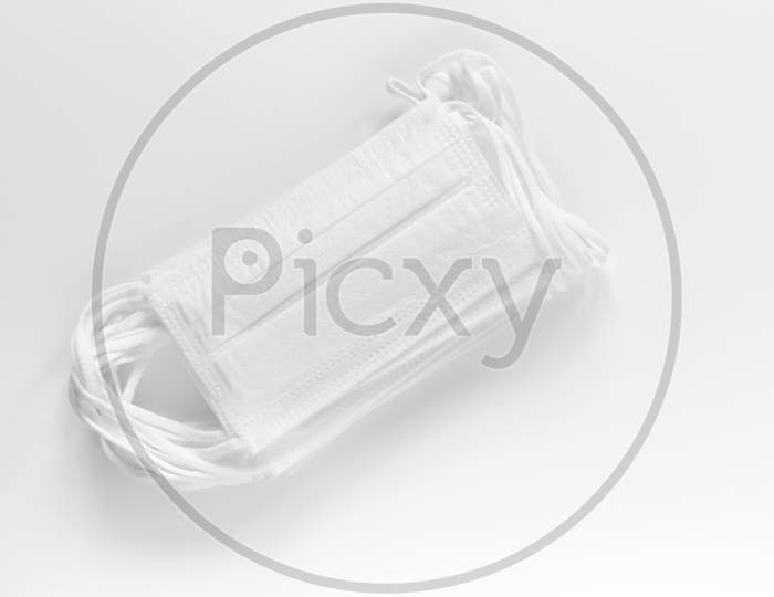 Coronavirus Covid-19 Pandemic. Antiviral Medical Mask For Protection Against Corona Virus. Surgical Protective Mask. Medical Protective Masks Isolated On White Background. Quarantine, Stay At Home.
