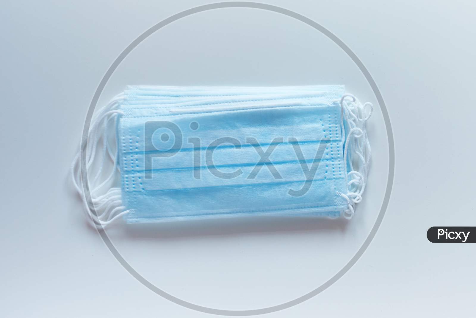 Prevent Coronavirus. Medical Protective Masks Isolated On White Background. Disposable Surgical Face Mask Cover Mouth And Nose. Healthcare Medical Coronavirus Quarantine. Hygiene Concept.