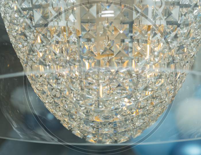 Beautiful Luxurious Crystal Chandelier Lit With A Glass Vault.