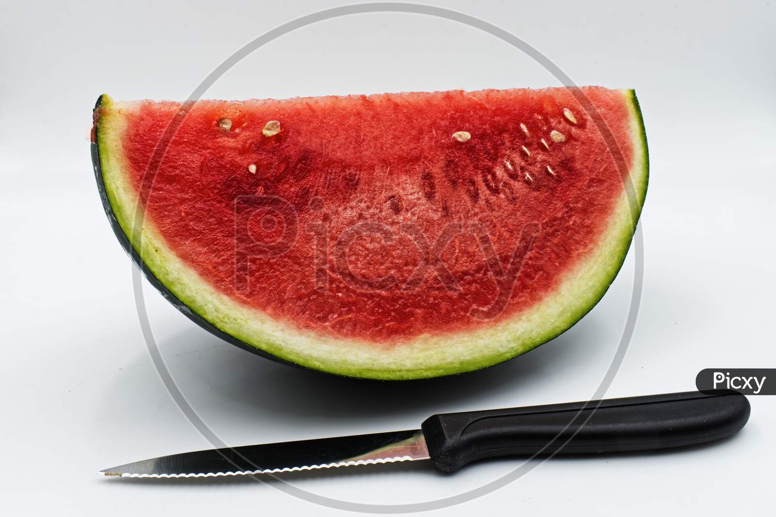 Fresh watermelon slice isolated on white background. Studio shot