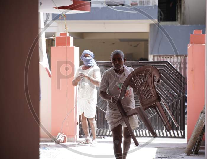 jaipur. Rajasthan. India - may 21, 2020 Asia people work hard about construction in factory with wearing mask (covid19 )