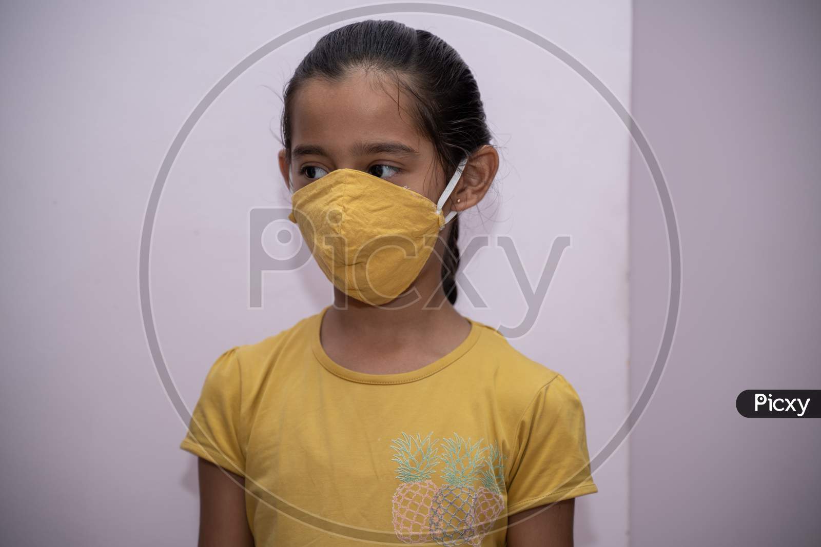jaipur . Rajasthan . India - June 12, 2020. Asian girl wearing protective face mask Protect from the corona virus or Coronavirus covid-19