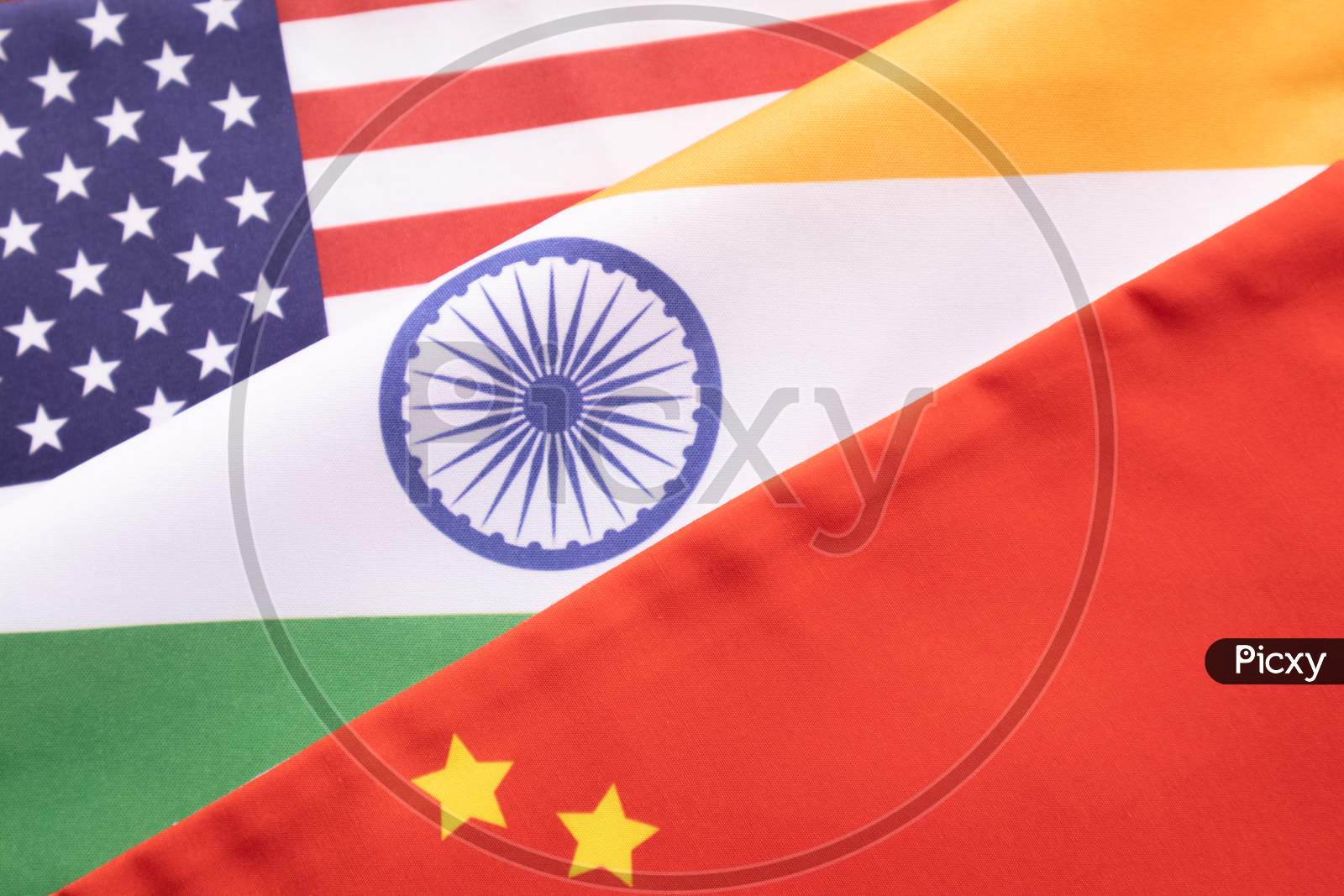 Concept of India, USA, and China relations showing with flags.