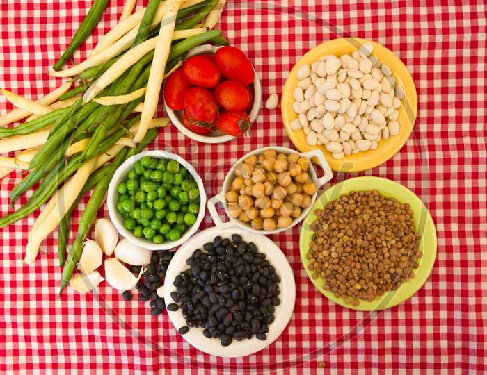 Variety Of Kitchen Ingredients With Fresh And Dried Legumes