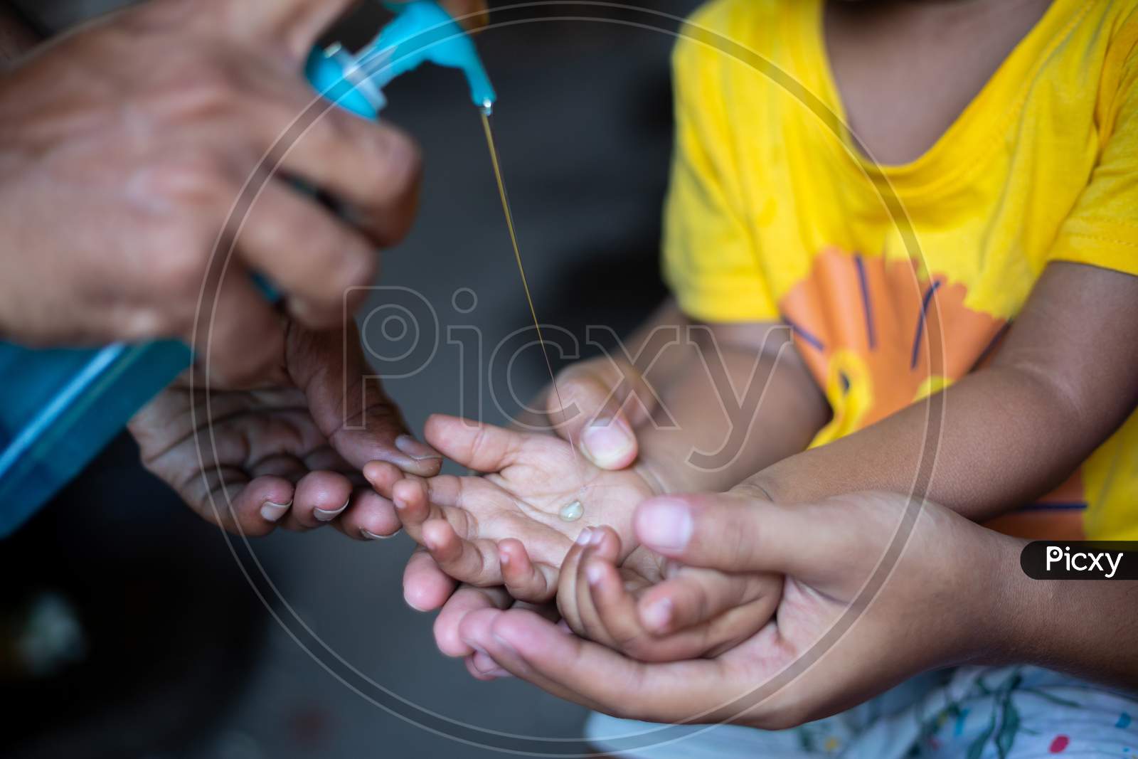 A Child Is Learning How To Clean Hands With Liquid Cleaning Gel. To Prevent Coronavirus, Rubbing Your Hands With Soap Is An Expert Way To Stop The Spread Of Coronavirus.