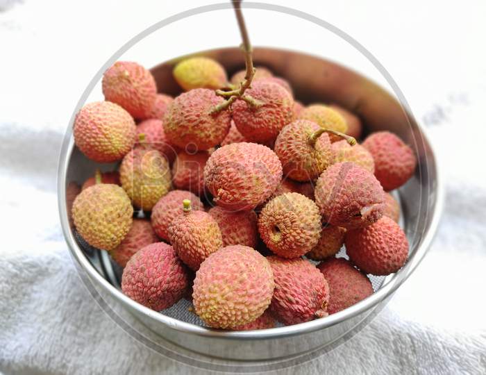 ripe lychee in a bowl