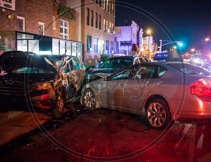Several Cars Crash At Night