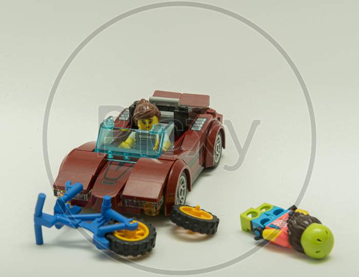 Minifigure Of Cyclist Getting Hit By Sportive Car.