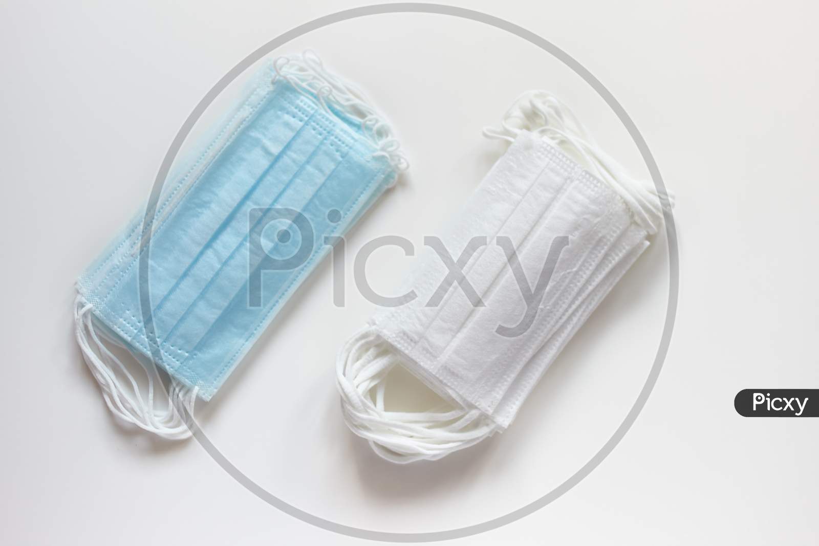 Protective Medical Masks Isolated On White Background. Disposable Surgical Face Mask Cover Mouth And Nose. Coronavirus Quarantine. Hygiene Concept.
