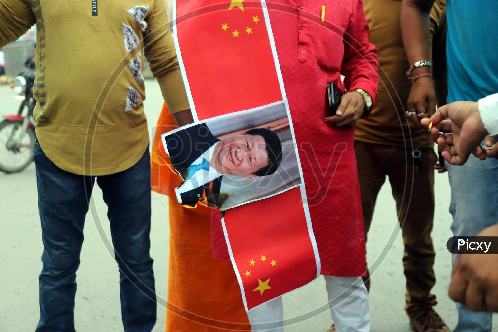 Supporters Of Bharatiya Jayanta Party (Bjp) Burn Posters Of China's President Xi Jinping During A Protest Against China in Prayagraj on June 17, 2020 after a violent face off between Indian Army and Chinese PLA in Galwan Valley.