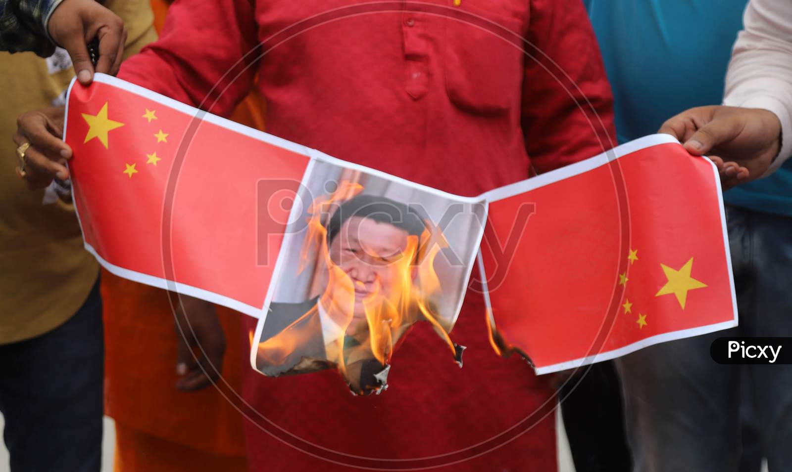 Supporters Of Bharatiya Jayanta Party (Bjp) Burn Posters and Effigy Of Chinese President Xi Jinping During A Protest Against China after a violent face-off between Indian Army and Chinese PLA , In Prayagraj, June 17, 2020.