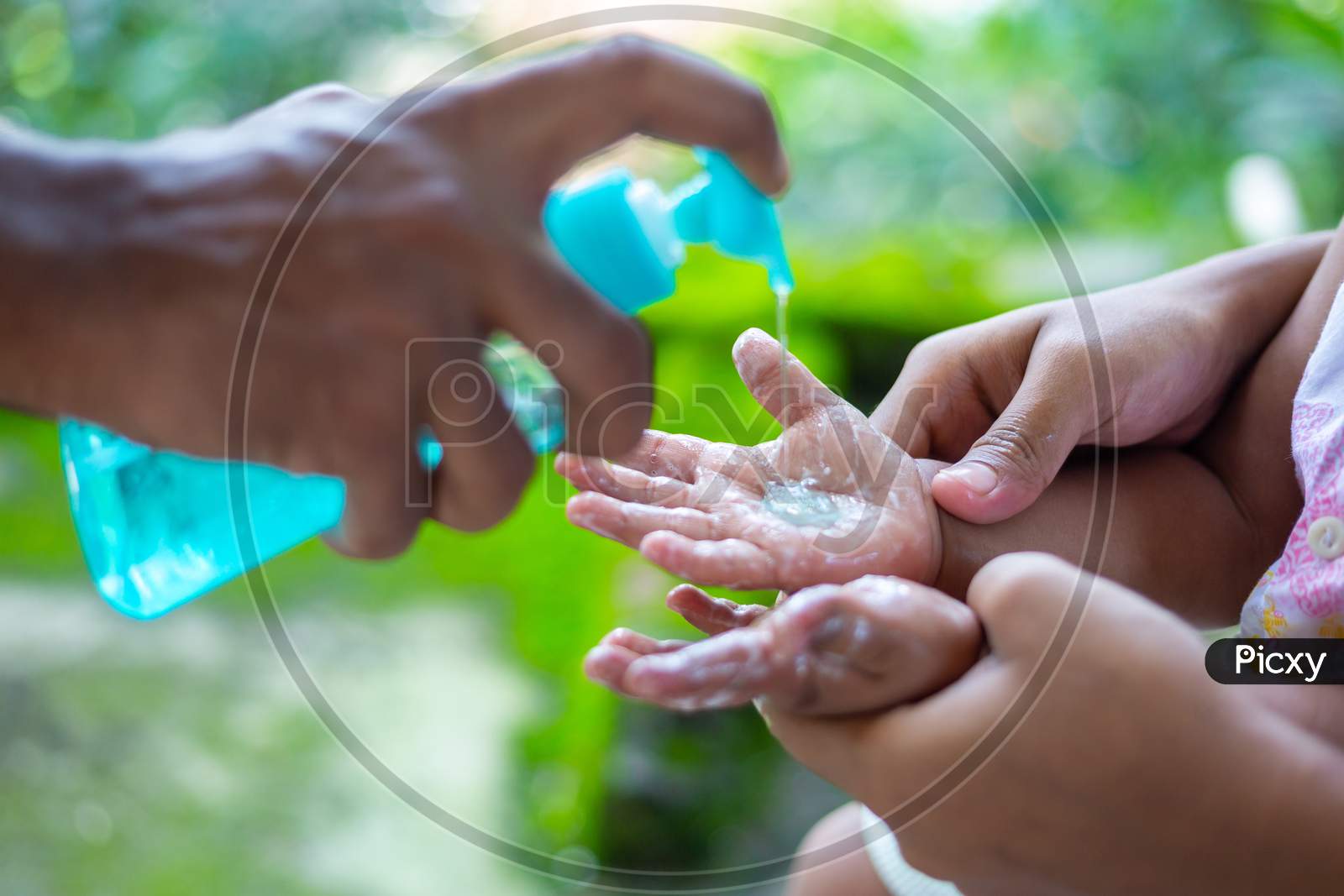A Parent Teaching His Baby The Habit Of Handwashing With Liquid Hand Wash. To Prevent Coronavirus, Rubbing Your Hands With Soap Is An Expert Way To Stop The Spread Of Coronavirus.