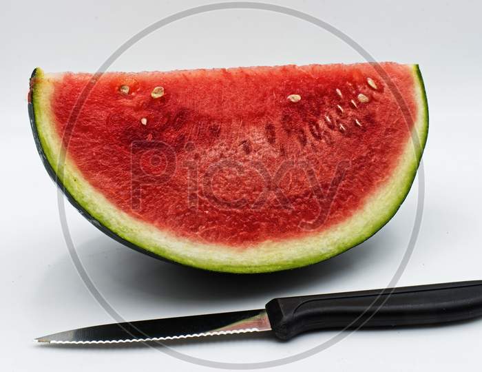 Fresh watermelon slice isolated on white background. Studio shot