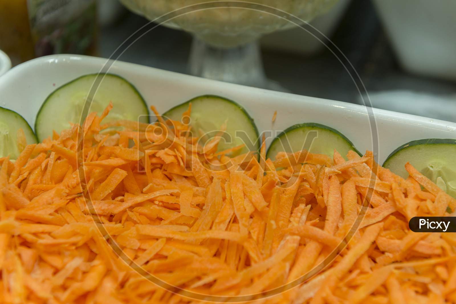 Closeup Of Fresh Shredded Carrots Isolated On White Background, Top View.
